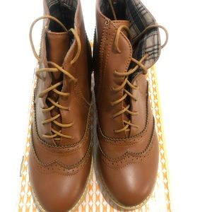 Vintage style wingtip booties.